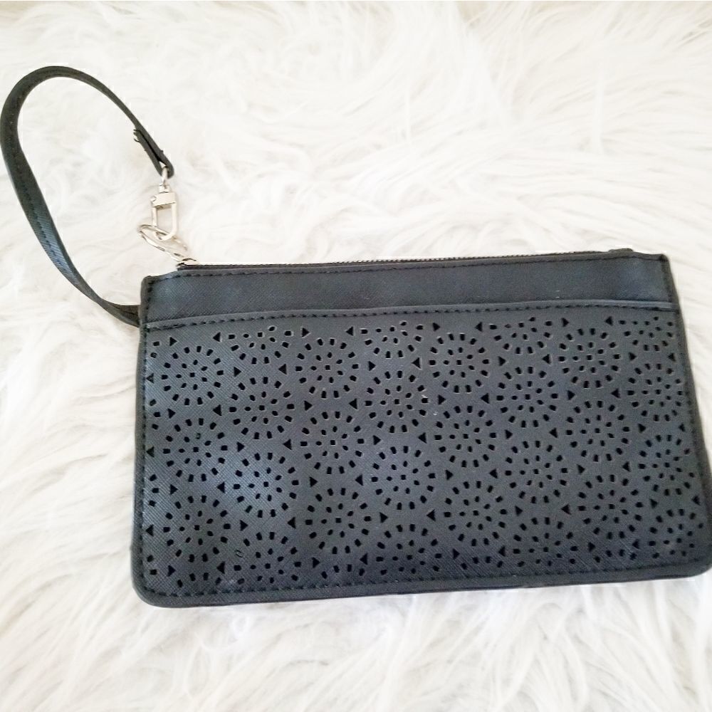 Sondra Robert's SR2 wristlet laser cutouts